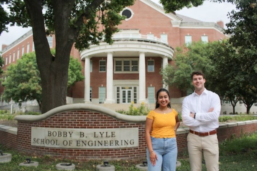 Student Standing in Front of the SMU Engineering Building